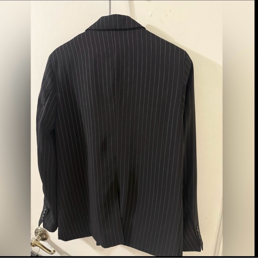 the blazer is DKNY brand size XS but like S
